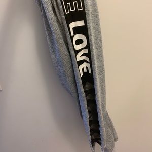 Cut out leg one love track pants